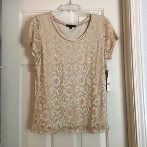 Women’s short sleeve top. Size L. NWT